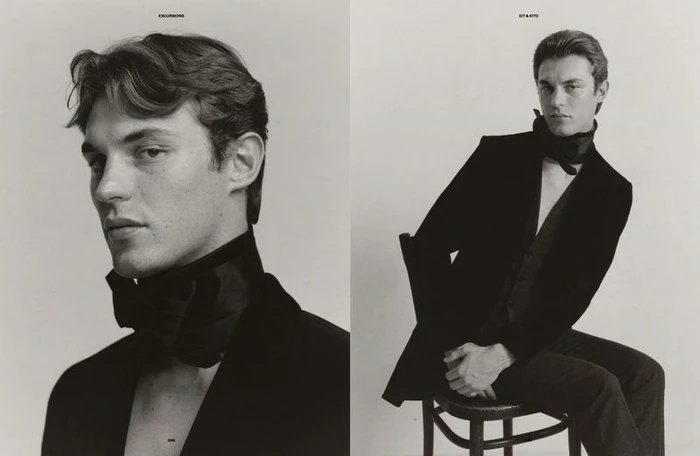 Black and white editorial diptych of model Kit Butler wearing a tailored black suit jacket and oversized neck bow against a studio backdrop.