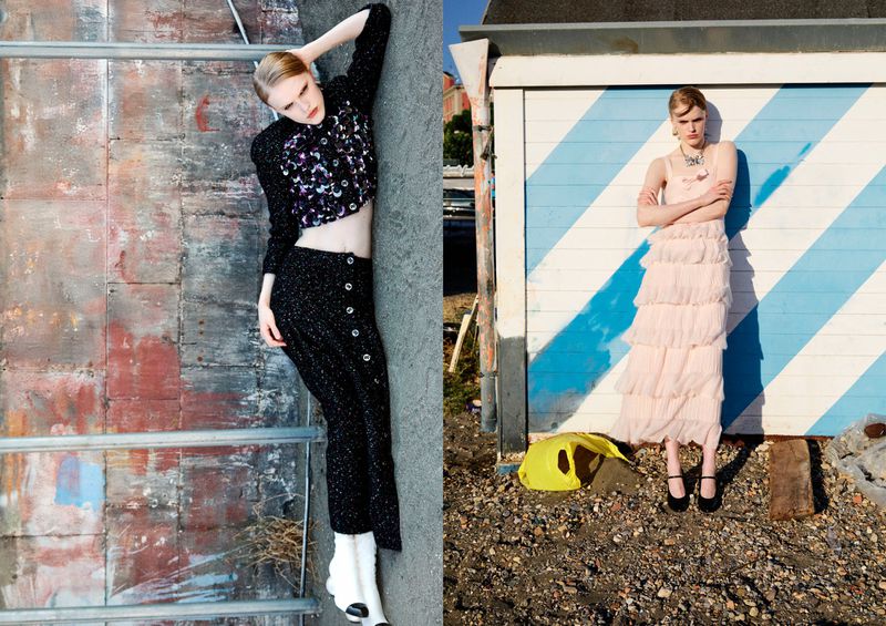 Fashion editorial split-image: woman in dark crop top and pants lies on a metal structure; woman in pink dress stands by striped building.