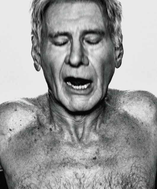 Black and white portrait of a mature adult man with closed eyes, mouth open, and torso visible against a plain white backdrop.