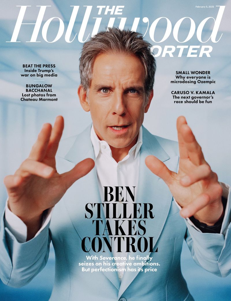 Ben Stiller on The Hollywood Reporter magazine cover wearing a light blue suit, posing with hands gesturing towards the camera.