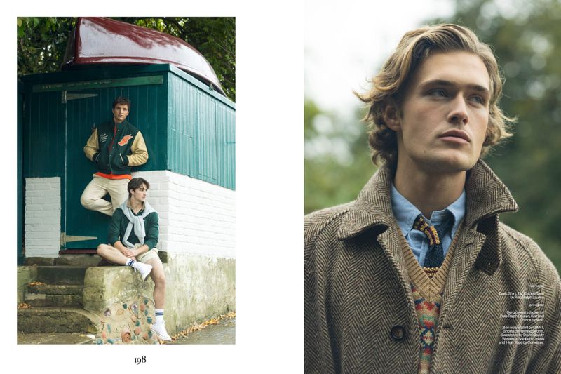 Two young men in preppy fashion stand near a green boathouse. Another man in a wool coat poses in an outdoor setting with trees.