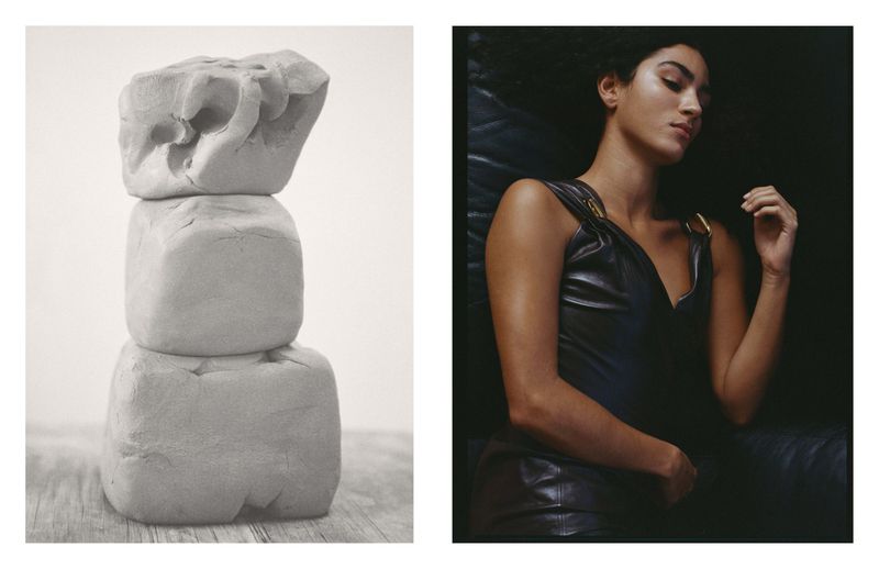 Creative studio shot: stacked clay cubes and a woman in a black leather dress against a dark backdrop, portrait orientation.