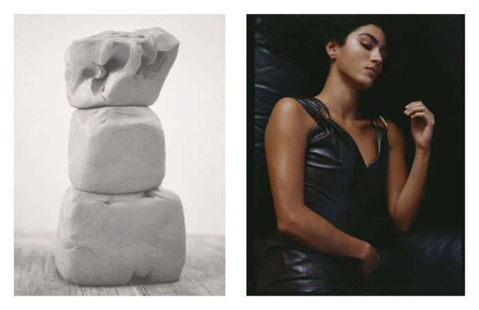 Creative studio shot: stacked clay cubes and a woman in a black leather dress against a dark backdrop, portrait orientation.