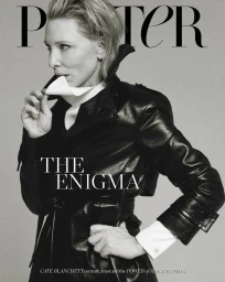 Black and white portrait of Cate Blanchett biting a white collar while wearing a dark leather coat against a grey backdrop