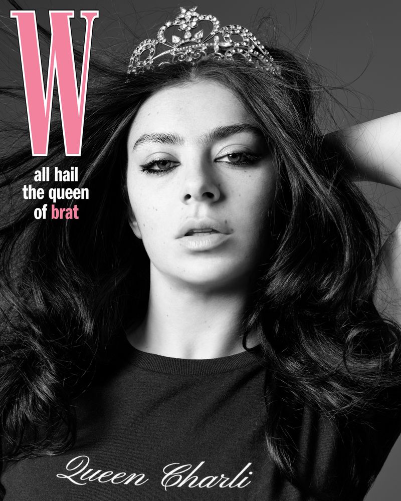 Black and white portrait of Charli XCX on a magazine cover, wearing a tiara and a black t-shirt with “Queen Charli” printed on it.