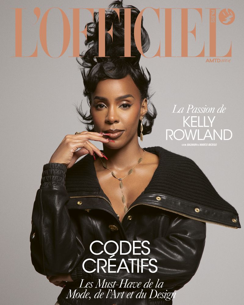 Kelly Rowland graces L'Officiel magazine cover in a black leather jacket. Her hair is styled high, and she wears gold jewelry.