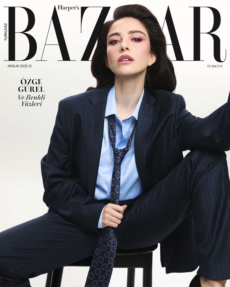 Magazine cover featuring Özge Gürel in a suit, with large 'BAZAAR' text visible. The model poses with direct eye contact.