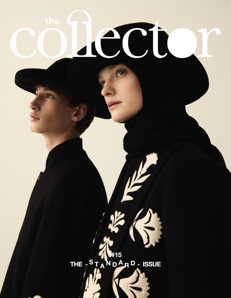 Magazine cover featuring two models in black coats and hats. The title 'the collector' is in white font at the top.