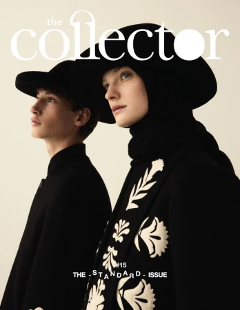 Magazine cover featuring two models in black coats and hats. The title 'the collector' is in white font at the top.