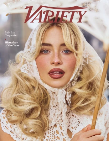 Sabrina Carpenter cover photo for Variety, posing with lace headscarf and patterned white dress holding a white parasol.