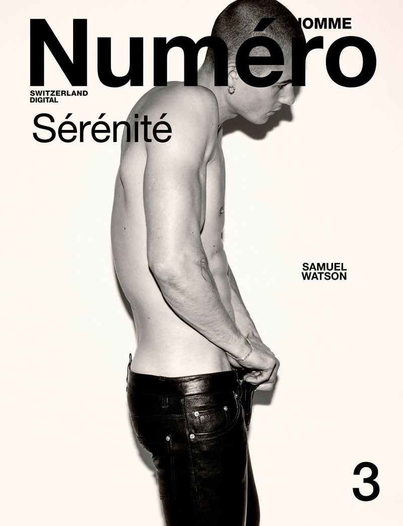 Magazine cover featuring a shirtless male model in black leather pants standing in front of a white background. The title is 'Numéro'.