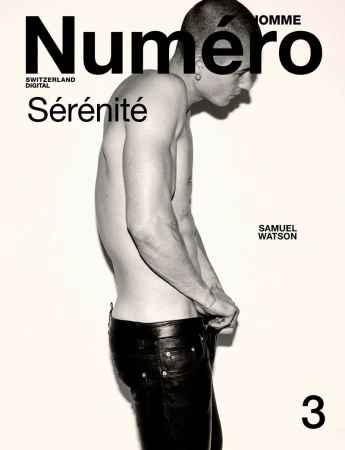 Magazine cover featuring a shirtless male model in black leather pants standing in front of a white background. The title is 'Numéro'.
