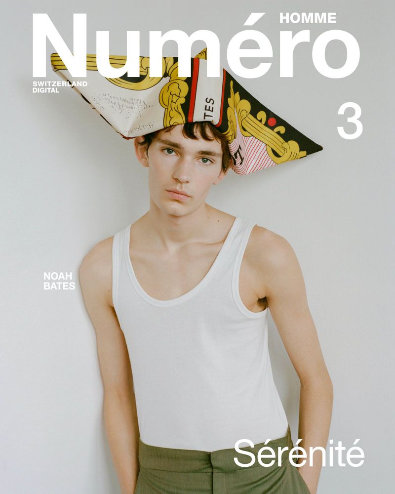 Numéro Homme magazine cover featuring a young adult male model wearing a white tank top and a patterned head covering.