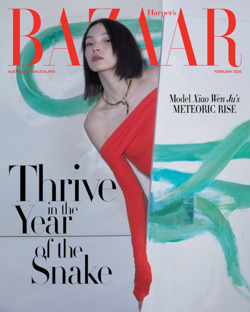 Fashion magazine cover featuring model Xiao Wen Ju in red dress and jewelry on a white backdrop with green and black graphic elements.