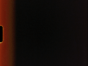 Close-up shot of a film border with an orange gradient against a dark background, displaying the physical details of 35mm film.