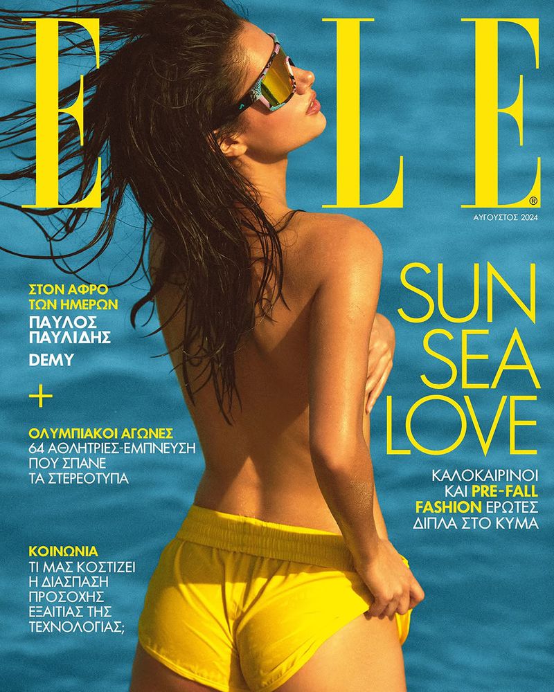 Elle magazine cover featuring a woman with sunglasses and yellow shorts, with a water background, evoking a summer, beach vibe.