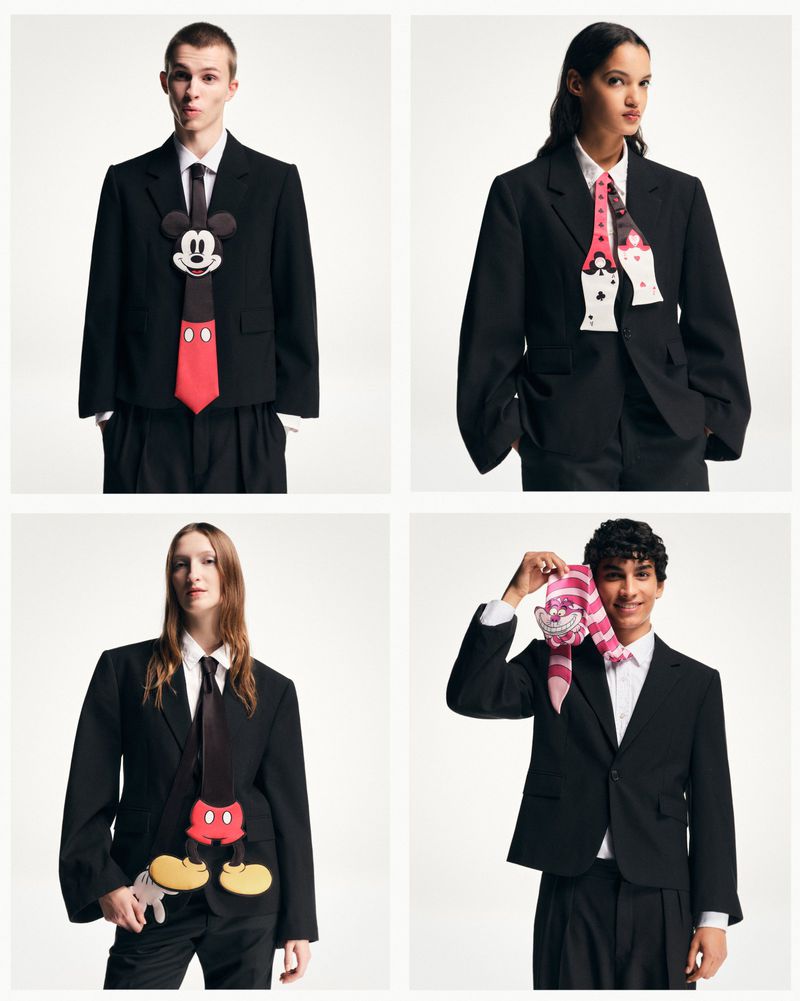 Fashion editorial featuring four young adults in black suits and ties, each wearing a playful, oversized character tie against a clean backdrop.