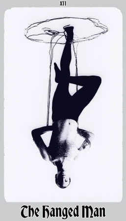 Black and white art of a nude man hanging upside down suspended from above, an artistic rendering with visible text.