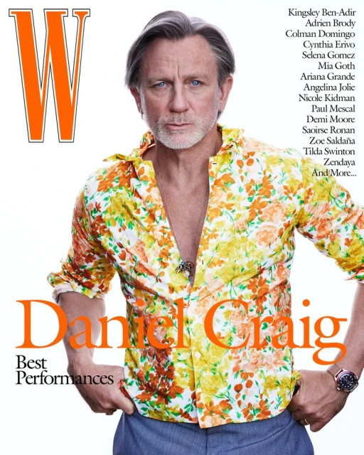 Daniel Craig gazes intensely in a medium shot, wearing a vibrant floral shirt and a wristwatch, with a white background and magazine text.