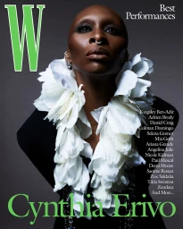 Cynthia Erivo wearing a sculptural white floral collar and black top for W Magazine Best Performances cover portrait.