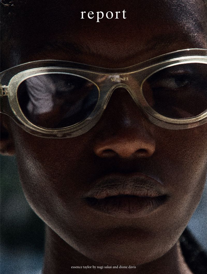 Close-up portrait of a dark-skinned person wearing sunglasses, showcasing an editorial fashion aesthetic and dark lighting.