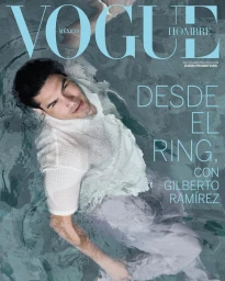 Gilberto Ramírez floating submerged in clear water wearing a white textured knit top on the Vogue Hombre cover.