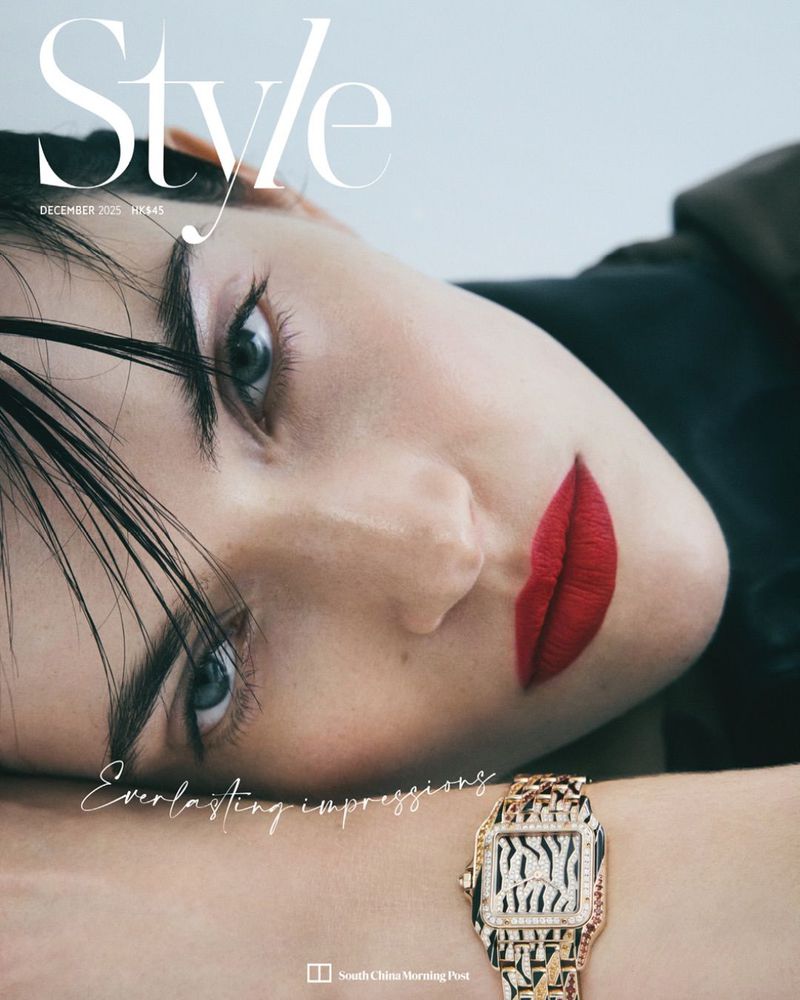 Close-up of a fashion magazine cover featuring a woman with red lips and a patterned wristwatch, with the title 'Style' at the top.