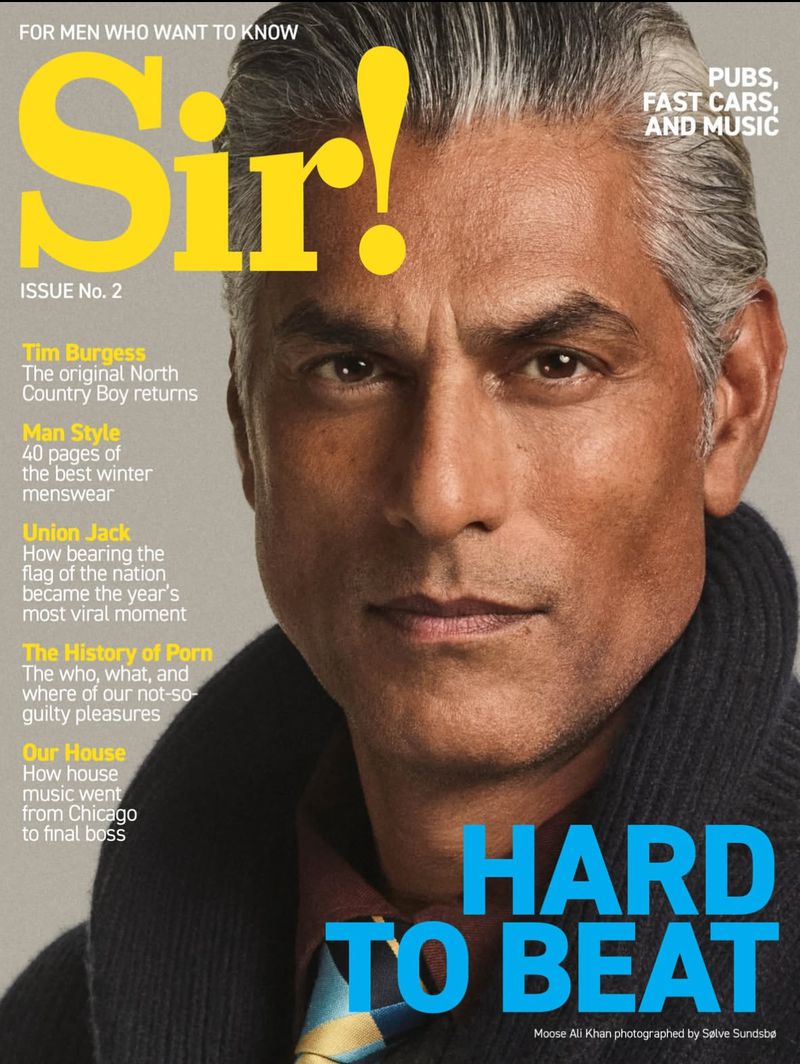 Magazine cover featuring a man with graying hair, wearing a blue sweater, against a neutral background. Text includes 'Sir!' and 'Hard to Beat'.