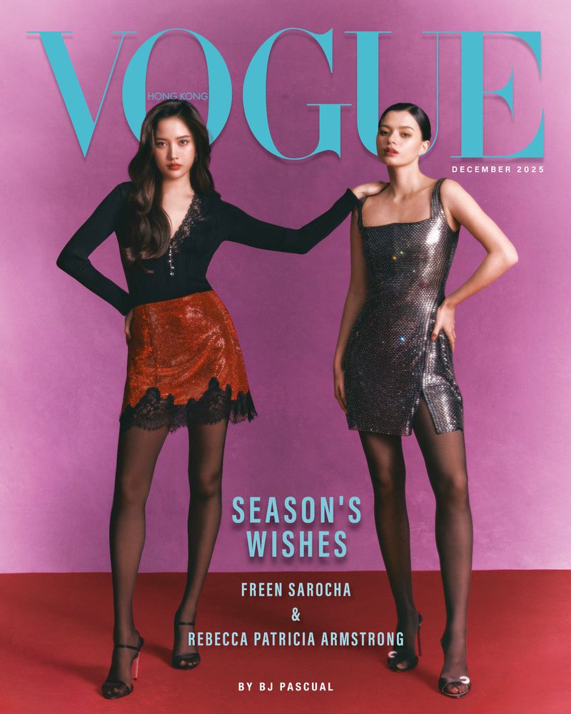 Vogue cover featuring two models wearing elegant dresses and hosiery against a purple backdrop, embodying high fashion and December 2025.