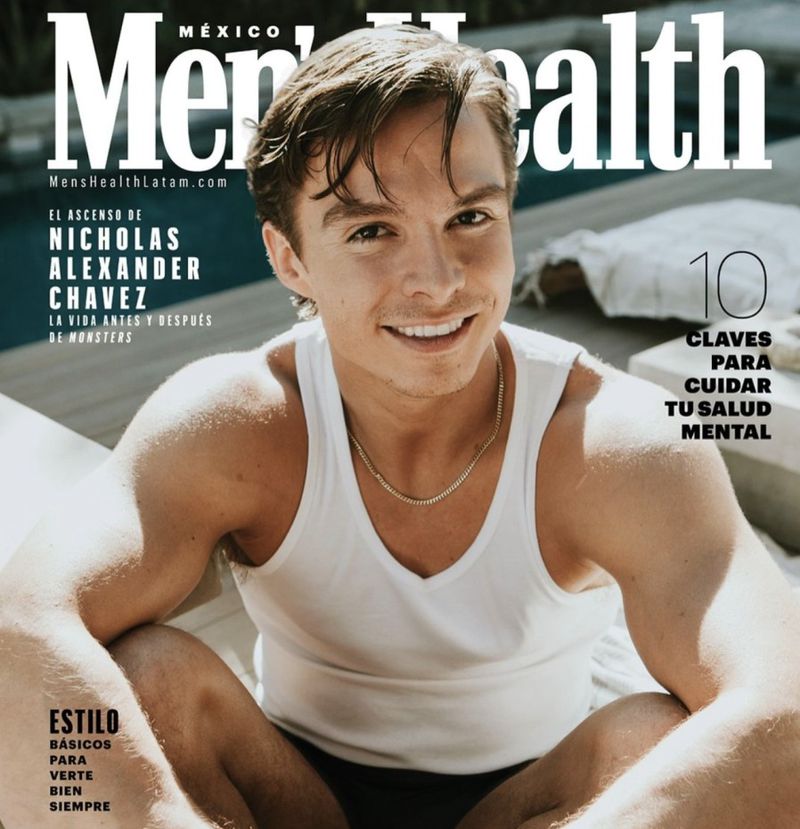 Men's Health magazine cover featuring Nicholas Alexander Chavez in a white tank top, outdoors with magazine text overlay.