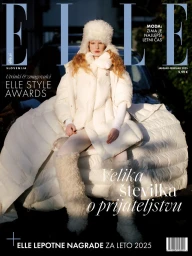 Model in white puffer jacket and fur hat seated on a car for Elle Slovenia January February 2025 cover.