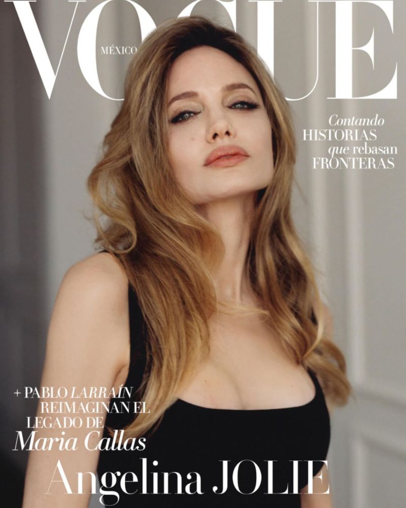 Angelina Jolie on Vogue Mexico cover. Close-up portrait of the actress with long blonde hair, wearing a black top against neutral backdrop.