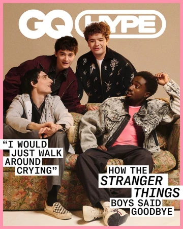 GQ Hype magazine cover featuring four male actors from Stranger Things sitting on a floral couch wearing casual and stylish clothing.