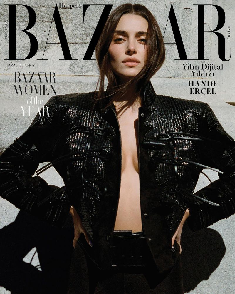 Harper's Bazaar Turkey cover featuring Hande Ercel wearing black leather jacket and belt, posing indoors with a grey textured wall background.