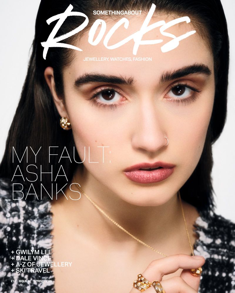 Magazine cover featuring a portrait of Asha Banks, adorned with jewellery, with the magazine title 'SomethingAbout Rocks' displayed prominently.