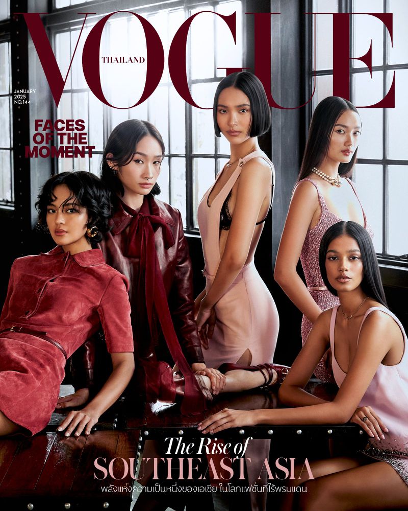 Vogue Thailand cover featuring five Southeast Asian female fashion models in pink and red outfits posing indoors near a window.