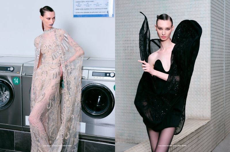 Two fashion models pose indoors, one in a sheer gown next to laundry machines, the other in a sculpted black dress against a tiled wall.