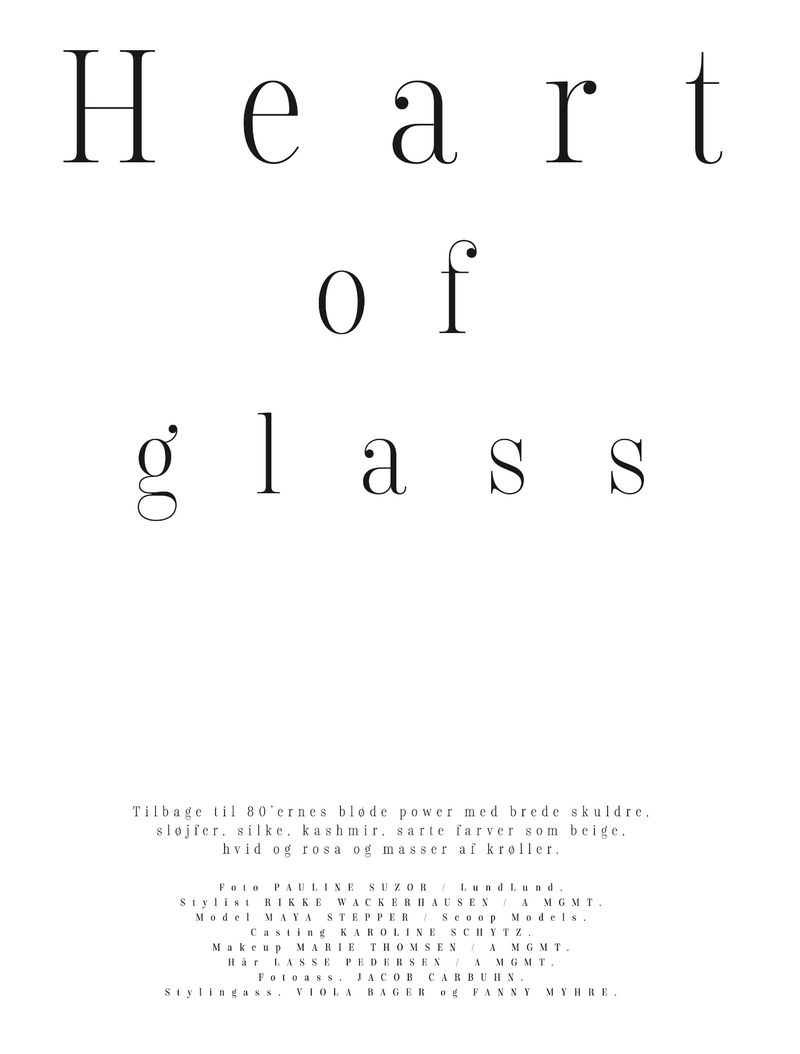 Artistic display with the words 'Heart of glass' stacked on top of each other with additional text at the bottom.