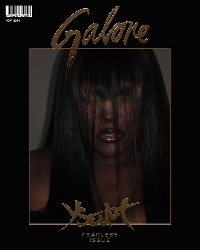 Magazine cover featuring a person with dark hair covering their face. The title 'Galore' is displayed prominently in gold lettering.