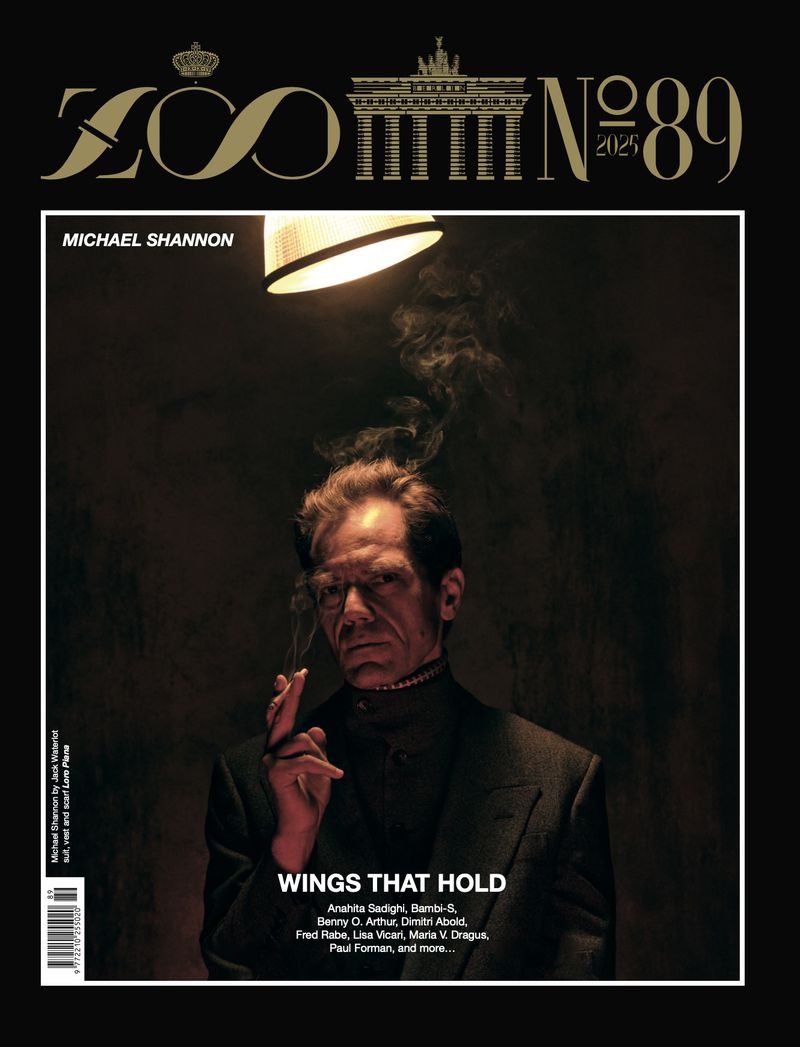 Magazine cover featuring Michael Shannon in dark suit, smoking with overhead lighting, on dark background. ZOO N°89 logo at top.