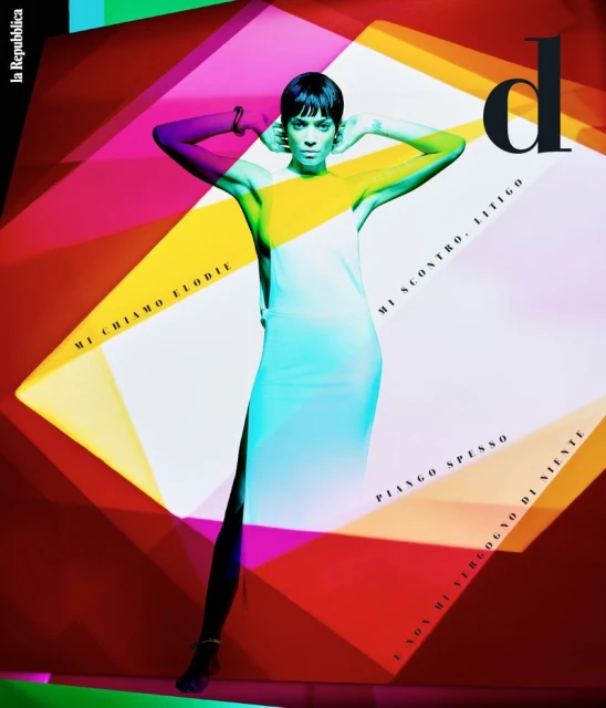An adult woman is posing in a magazine cover with geometric design elements, in a studio setting, featuring the publication name 'la Repubblica'.