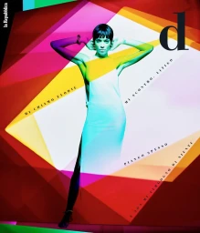 Magazine cover portrait of a woman with short dark hair in a white dress against a colourful geometric backdrop for D Repubblica.