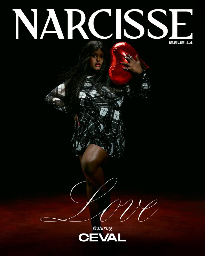 Magazine cover featuring a full-figured black woman in a plaid dress, holding a heart-shaped balloon against a dark background.