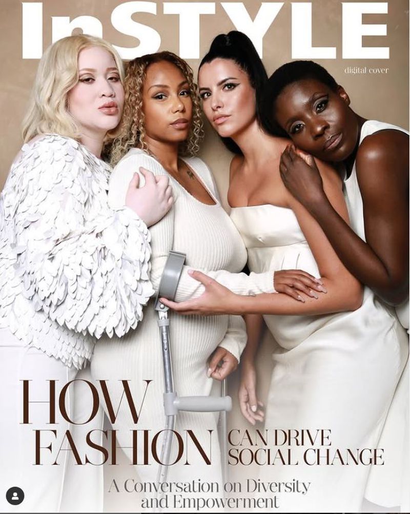 Magazine cover featuring four diverse women in white outfits. The woman in the middle is using a crutch. 'InStyle' title visible.