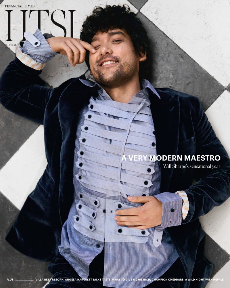 Portrait of Will Sharpe on magazine cover: Financial Times HTSI features smiling male in blue jacket, patterned shirt, and checkerboard floor.