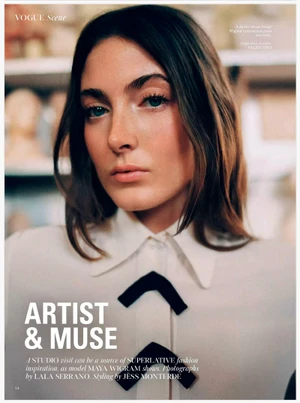 Editorial close-up portrait of model Maya Wigram wearing a white collared blouse with black chevron accents for British Vogue.