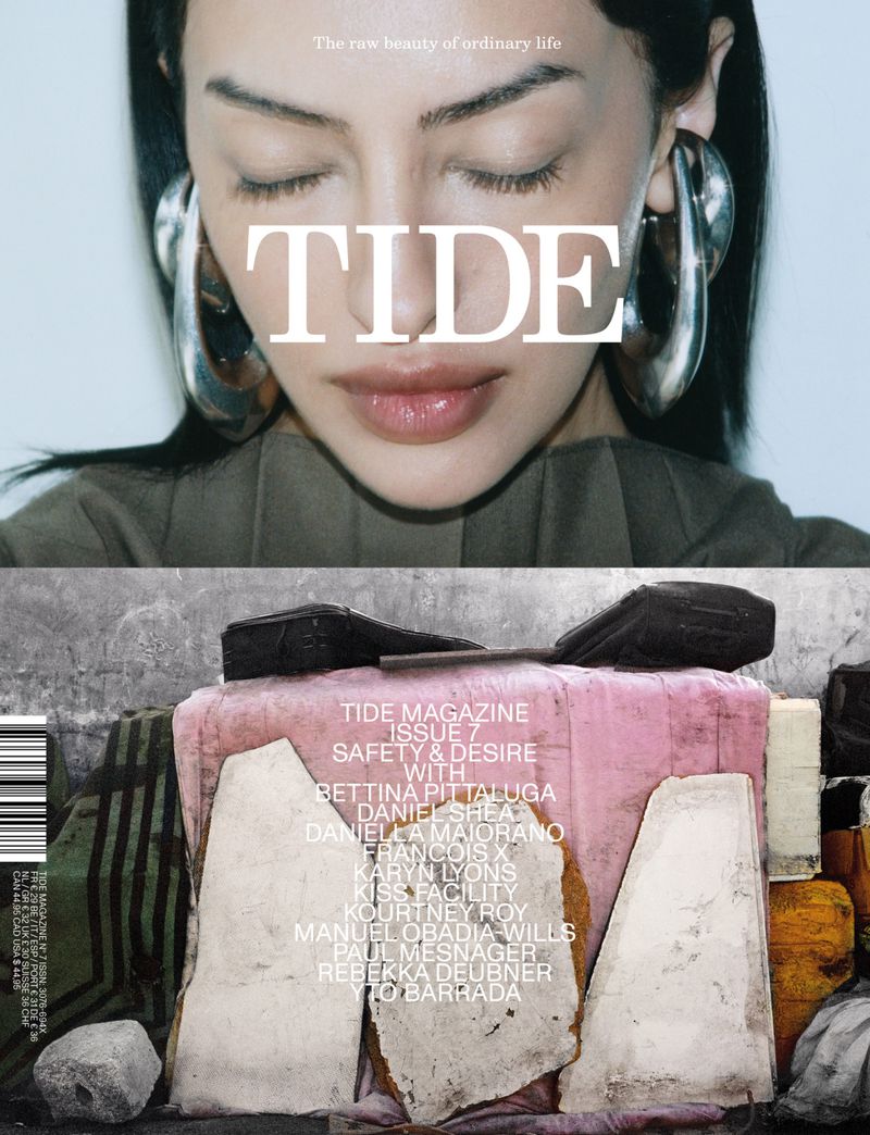 Magazine cover featuring a woman with large silver earrings, below an abstract design of stacked weathered materials with visible text.