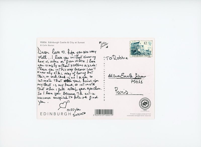 Postcard featuring Edinburgh Castle and a handwritten note to Robbie from Paris with stamp of Edinburgh Castle and Colin Baxter logo.