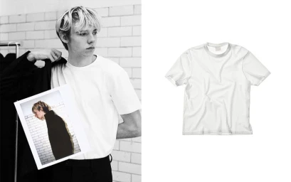 Monochrome image of young male model holding framed portrait against a tiled wall beside a white t-shirt product shot