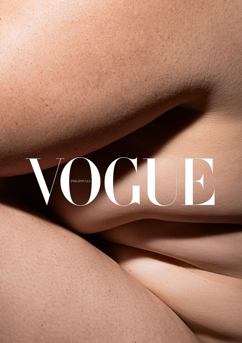 Minimalist nude skin texture with 'Vogue Philippines' masthead in white text. Fashion editorial shot in soft, diffused lighting.